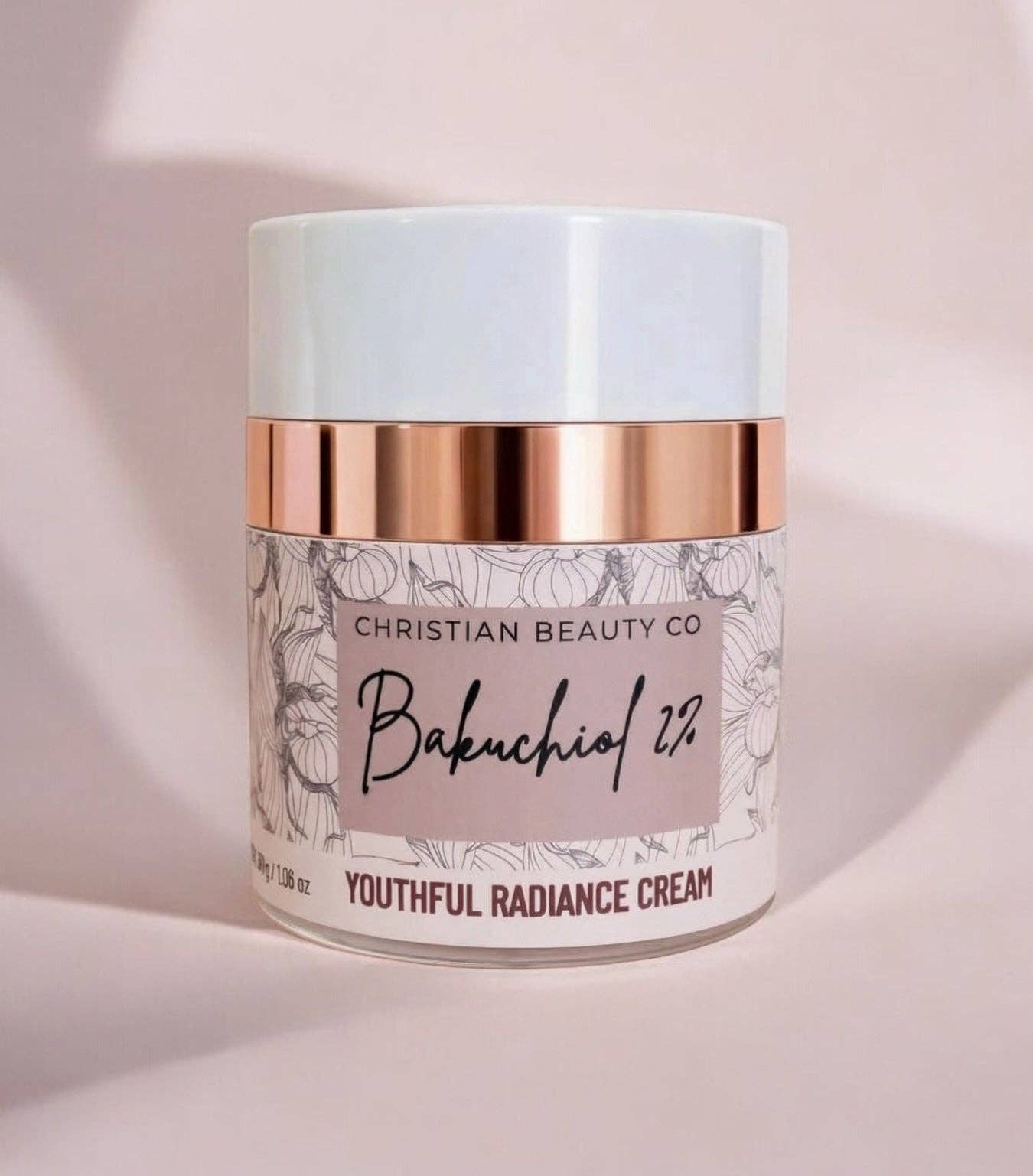Christian Beauty Co Bakuchiol 2% Radiance Cream moisturizer in jar on soft pink background