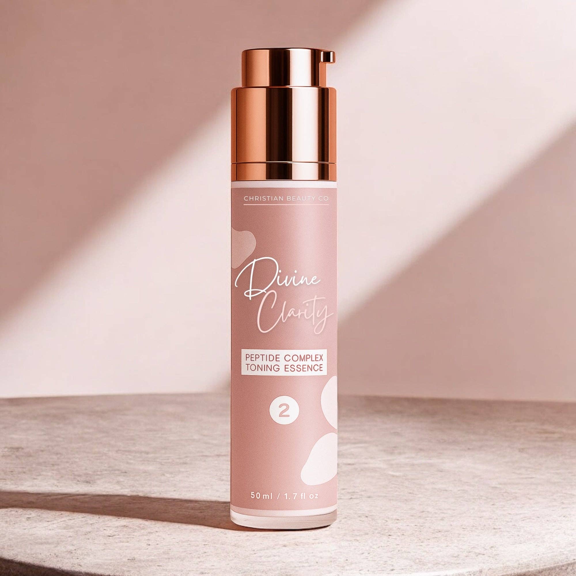 Skincare bottle labeled 'Divine Clarity' on a light background