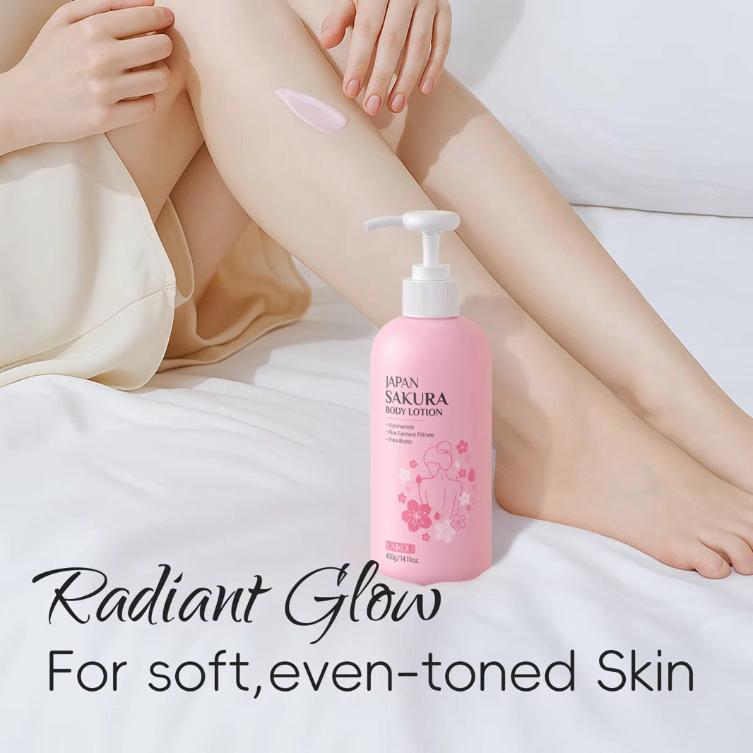 Pink bottle of Sakura body lotion with a person applying it to their leg on a white background