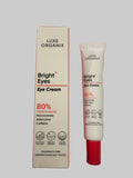 Luxe Organix Bright Eyes Eye Cream with box and tube packaging on white background.