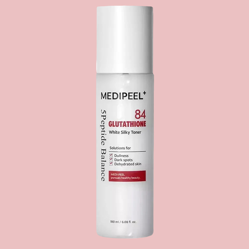 Medipeel 84 Glutathione toner bottle on a pink background