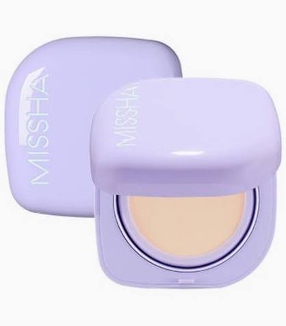 Missha compact powder with purple case on a white background