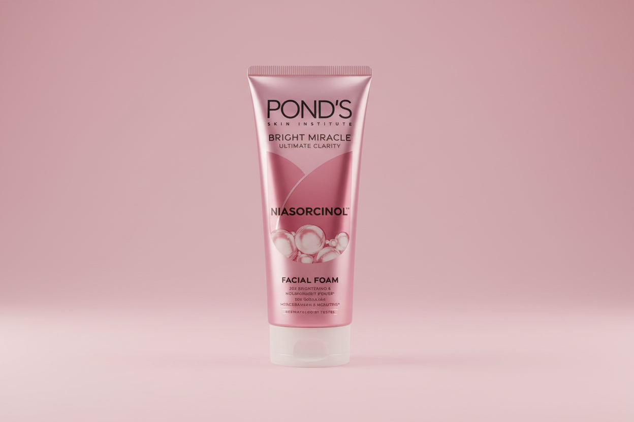 Pond's facial foam tube on a pink background