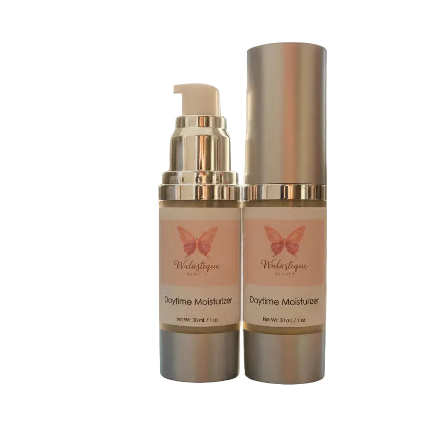 Two bottles of Walastique Beauty Daytime Moisturizer on a white background.