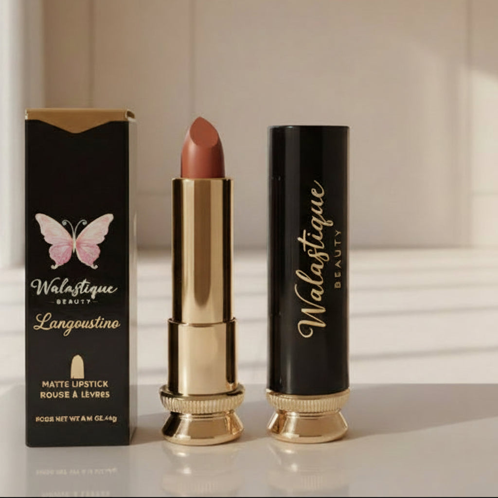 Matte lipstick in Langoustino shade by Walastique Beauty, warm coral-red tone with matte finish
