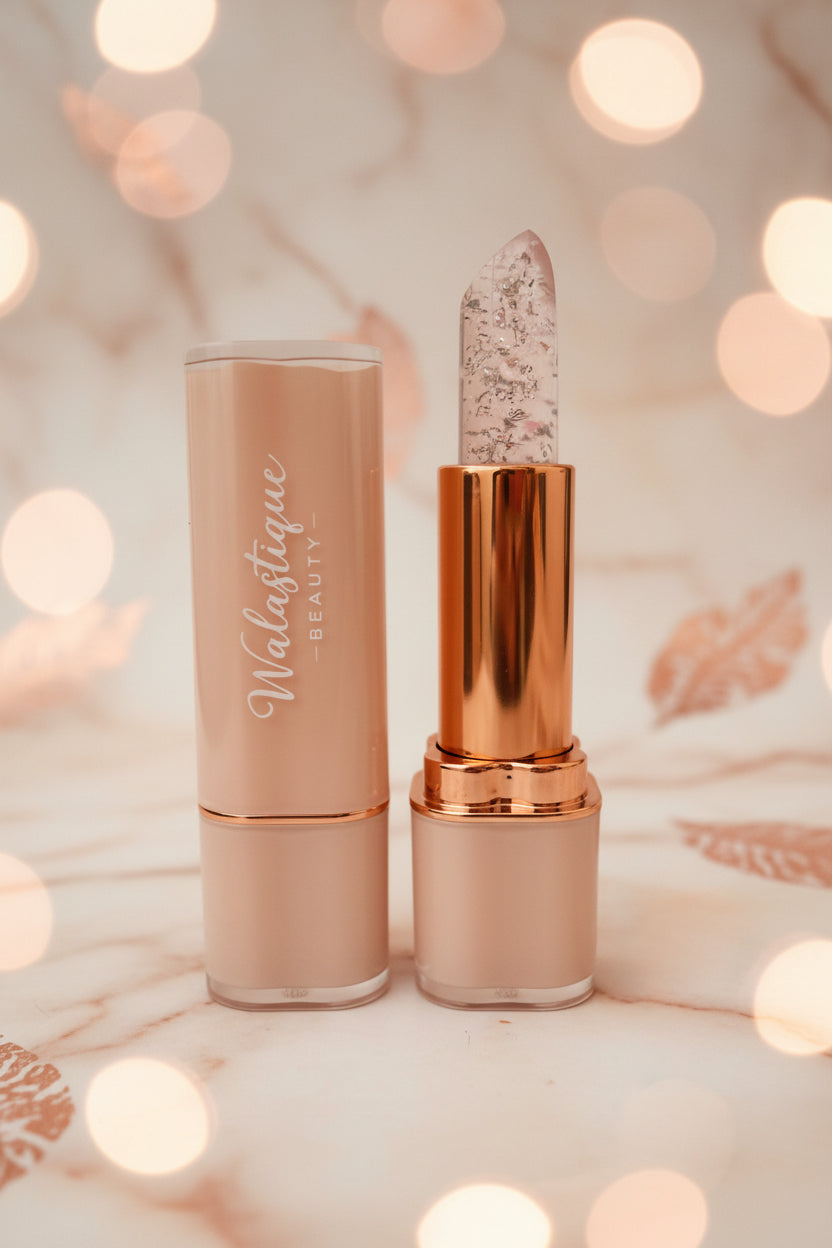 Walastique Beauty crystal clear lipstick on a blurry background