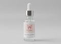 Walastique Beauty hyaluronic acid serum in clear glass dropper bottle on light grey background.